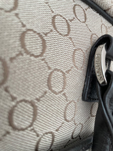 Oroton Monogram Fabric and Leather Laptop Bag
